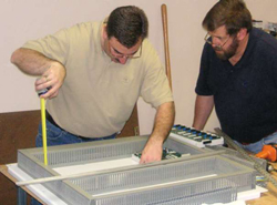 Stan and David working in assembly shop